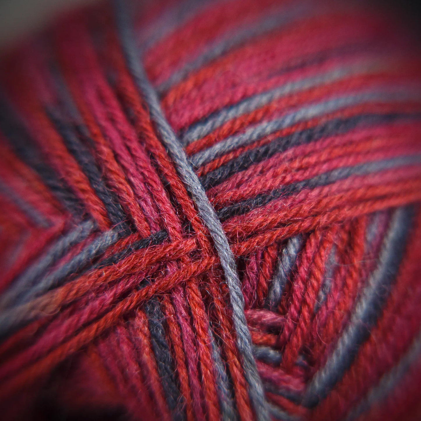 Close-up of 75% New Zealand wool ‘Roasted Fig’ yarn, with warm undertones and visible twist structure.