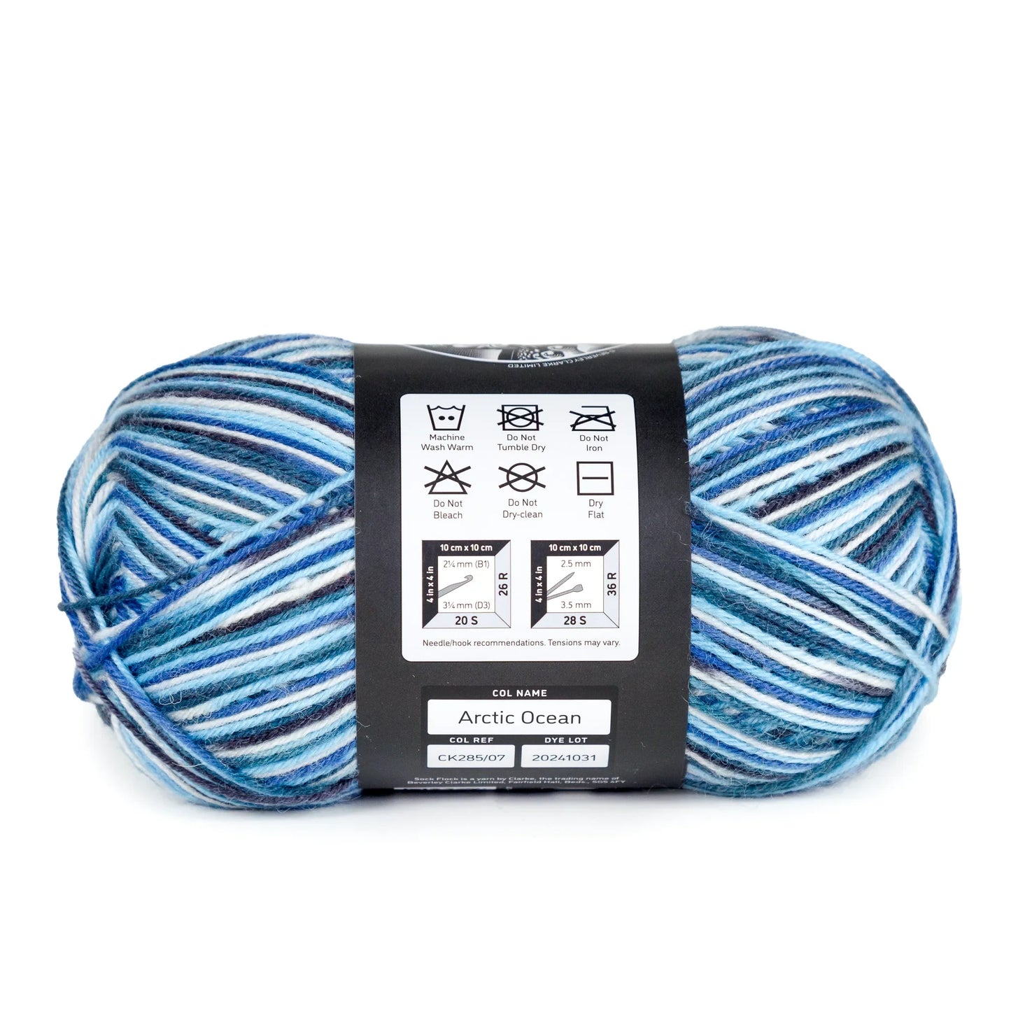 Side view of Arctic Ocean yarn ball showing label and wind structure against white background.