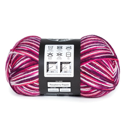 Side view of Raspberry Ripple yarn ball on white background, showing label and care instructions.