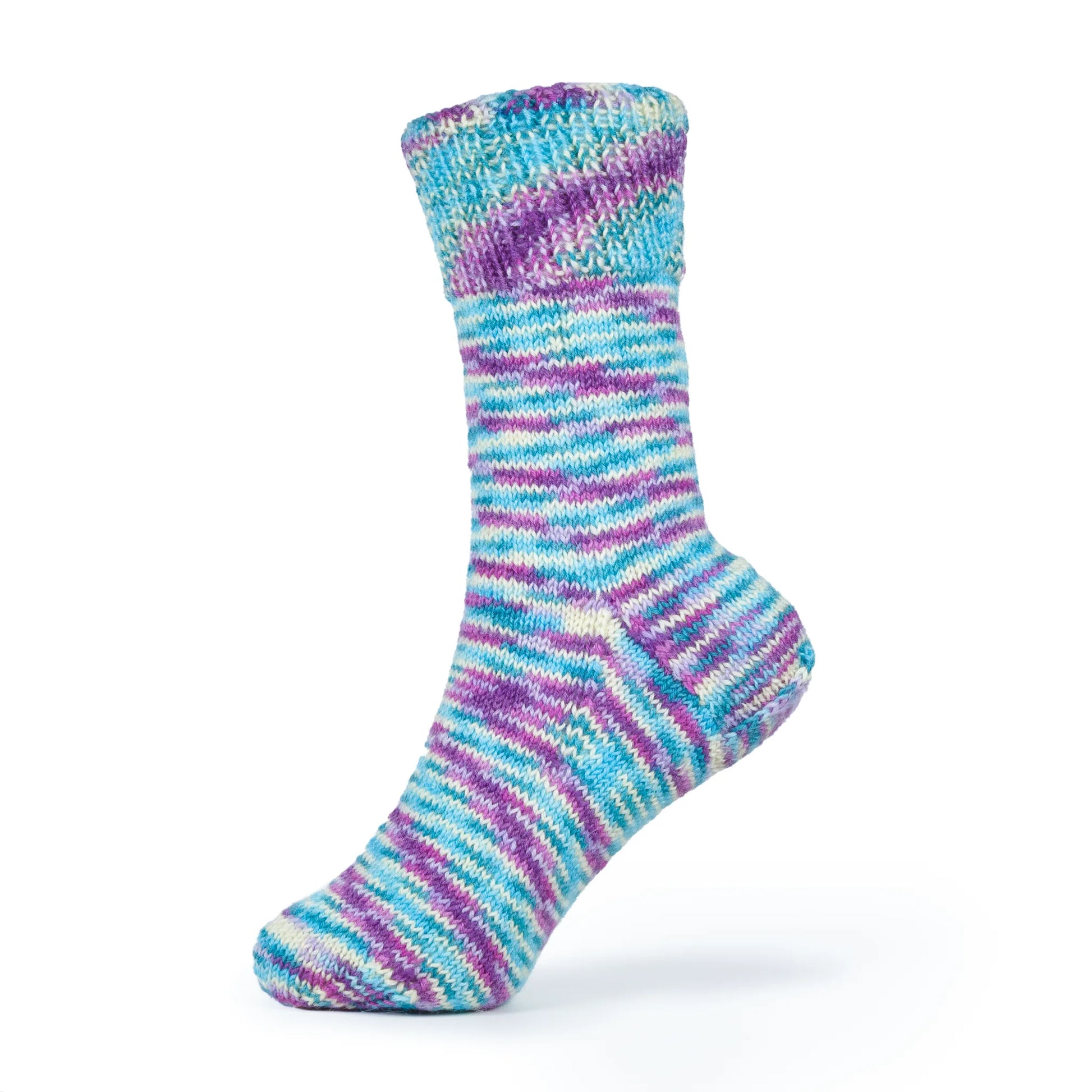 Left sock in Sea Glass yarn on mannequin foot, showing smooth fade between soft coastal tones.