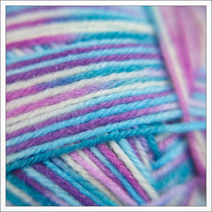 Square crop close-up of Sea Glass yarn with pale green-blue hues and gentle variegation.
